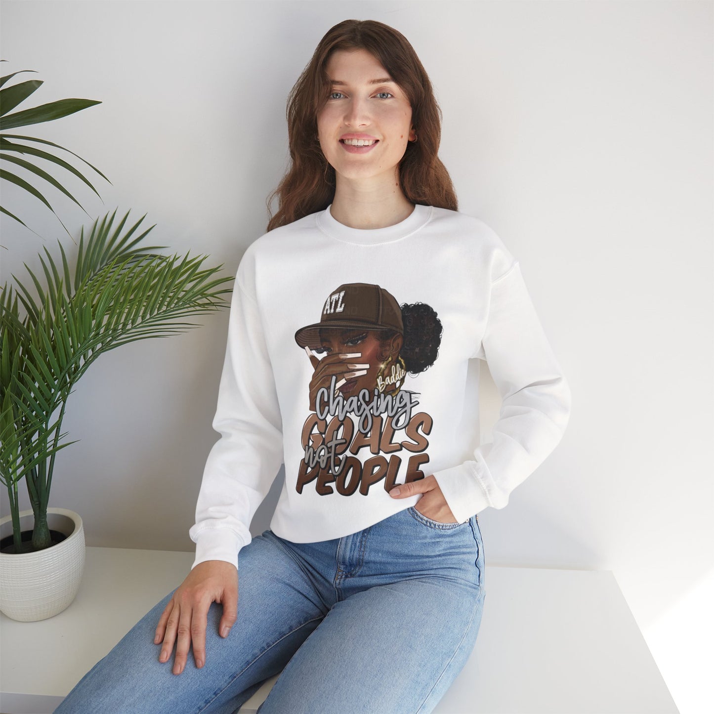 Crewneck Sweatshirt — "Chasing Goals Not People" Graphic (Girl with Cap)